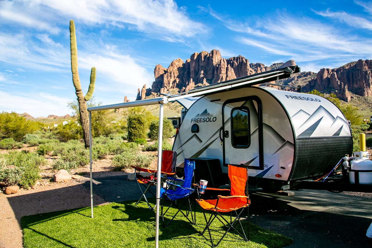 our-story Explore breathtaking camping views at Apache Junction with a camper and iconic cactus backdrop.